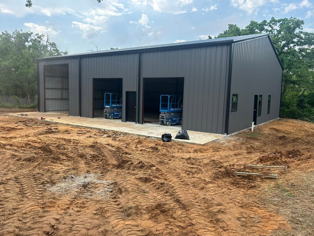 Metal building interior being wired for electrical