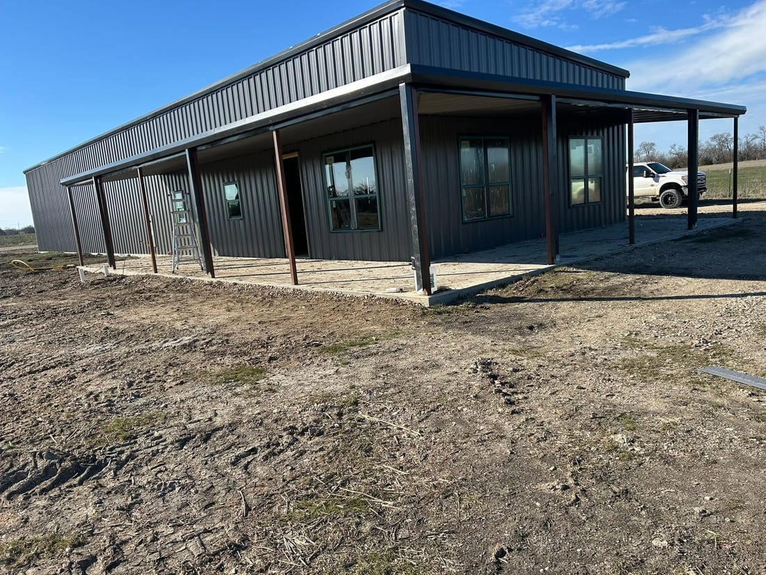 Dark metal shop with a long side awning